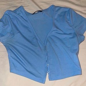 Made in China, size XS EU 34 US 2, cold gentle, with like colors, tumble dry low